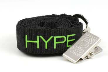 Coiled black lanyard with 'HYPE' in green beside a shiny metal clip.
