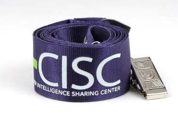 Purple lanyard with white text coiled with a metal clip attached.