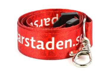Red lanyard with printed text and a metal clip on a white background.