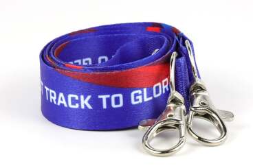 Coiled blue lanyard with 'TRACK TO GLORY' text and two metal clips.