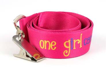 Pink lanyard with 'one girl can' text and a metal clip.