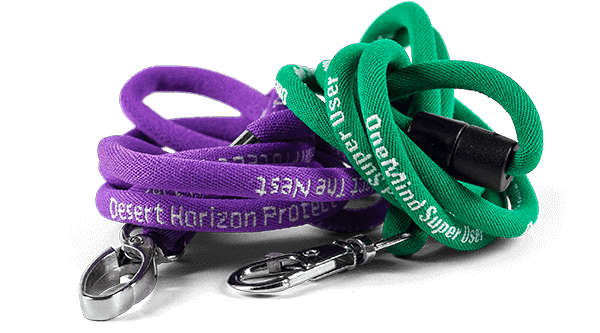 Purple and green lanyards with white text and carabiner attachments