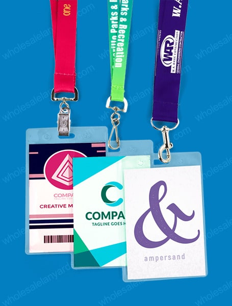 3 colorful lanyards with clear badge holders, holding corporate badges